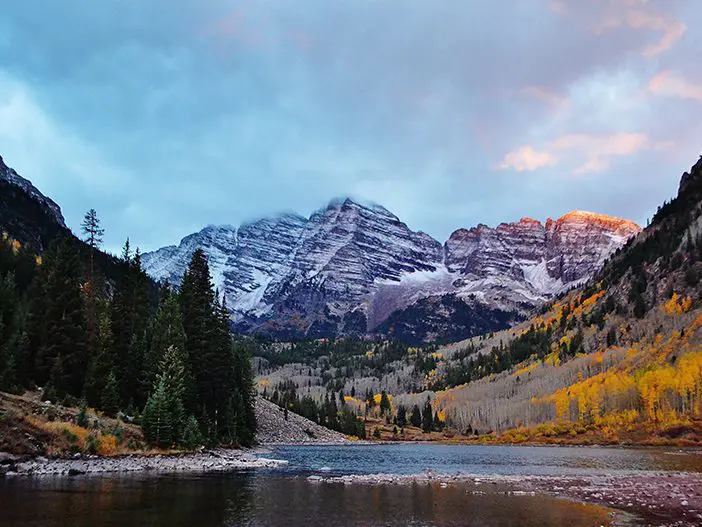 A mountain range with snow on top of it.